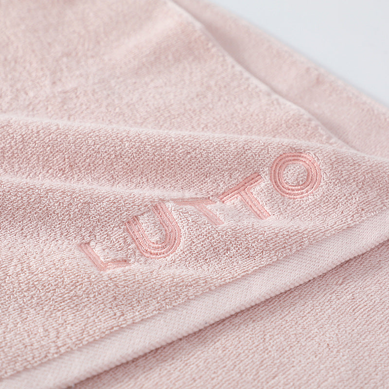 Soft cotton face towel folded and stacked