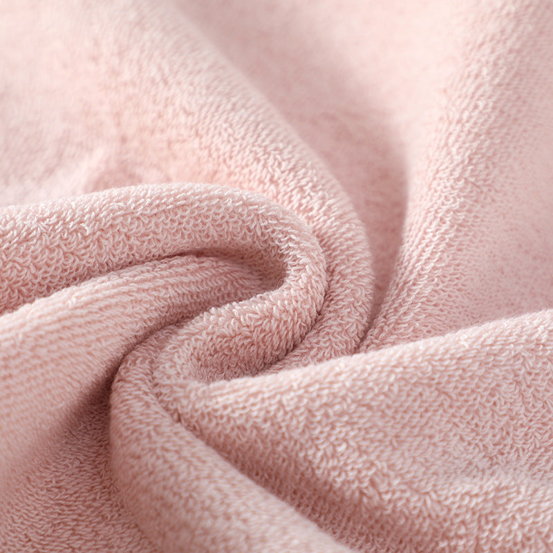 Premium cotton face towel in white with embroidered finish