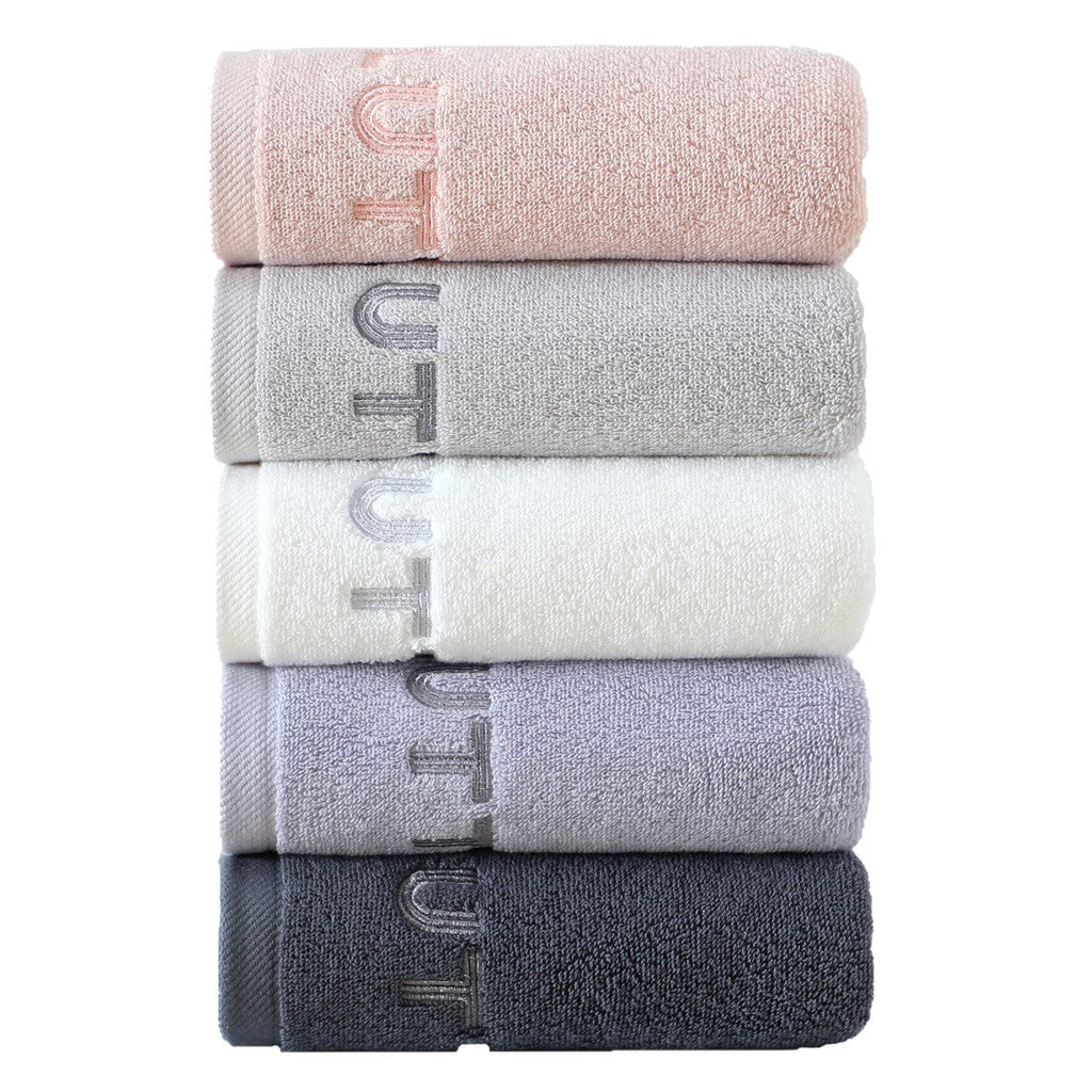 Cotton face towel being used for skincare routine